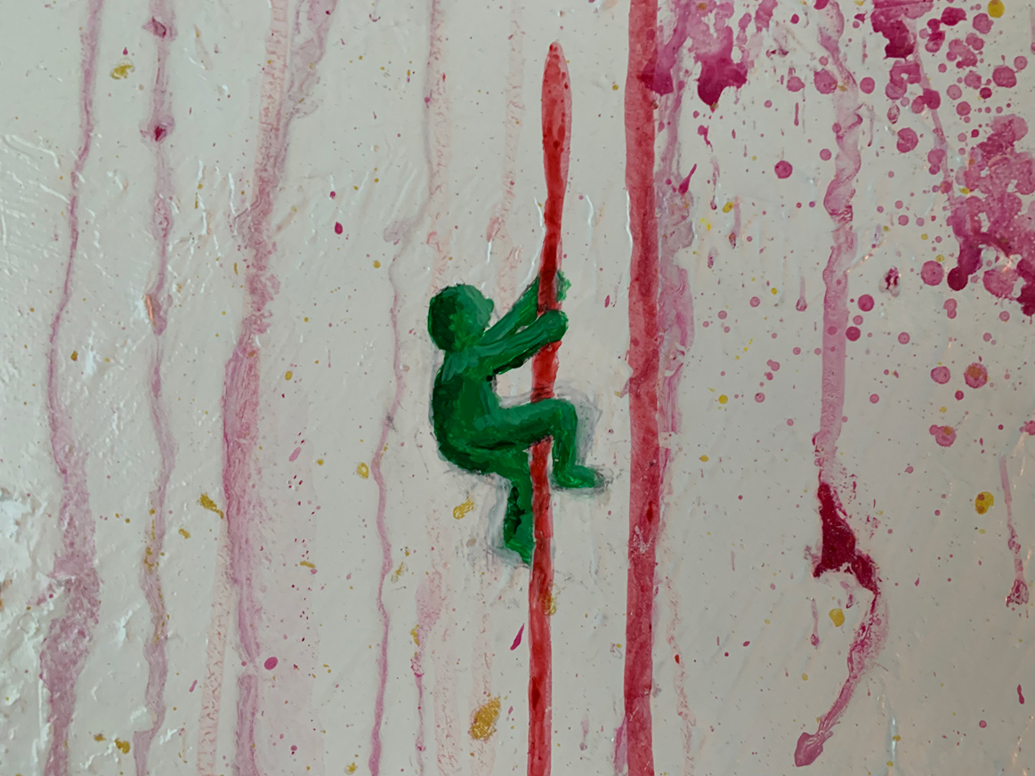 Detail showing a small green figure climbing through Pixel Emotion